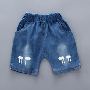 Conjunto Infantil “Aventuras de Verão” – Camiseta Estampada + Shorts Jeans